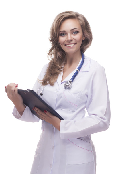 Portrait of cheerful female doctor with clipboard - Photo, image