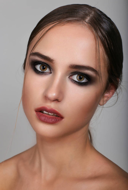 Beautiful woman with evening make-up. Smoky eyes. Fashion phot - Fotó, kép