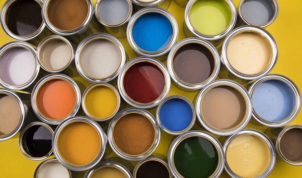 Paint cans color palette, yellow background - Foto, imagen