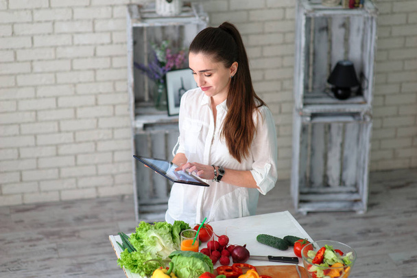 Young Woman Cooking. Healthy Food - Vegetable Salad. Diet. Healthy Lifestyle. Cooking At Home. Prepare Food - Photo, Image