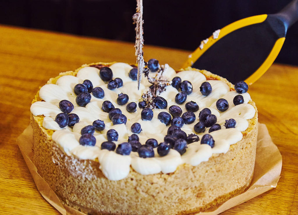 Blueberry cake and fruit chocolate cakes are being served in restaurant - Zdjęcie, obraz