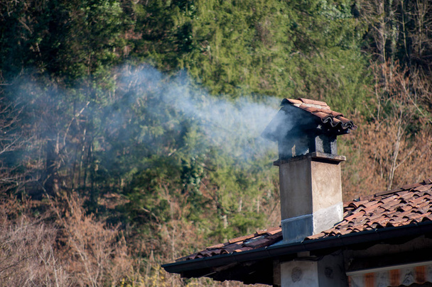 chimney fuming by wood stove - Photo, Image