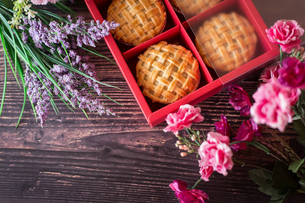 Pies on Red Gift box. for Valentines, New years or Chinese new year concept - 写真・画像