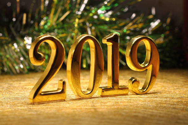 2019 gold numbers text and decoration. New year is the first day of the year in the Gregorian calendar. - Fotó, kép