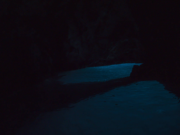Beautiful blue water inside blue cave on island Vis in Croatia. - Photo, Image