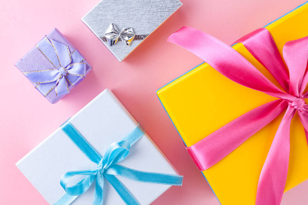 Gift boxes on a pink background - Foto, Imagen
