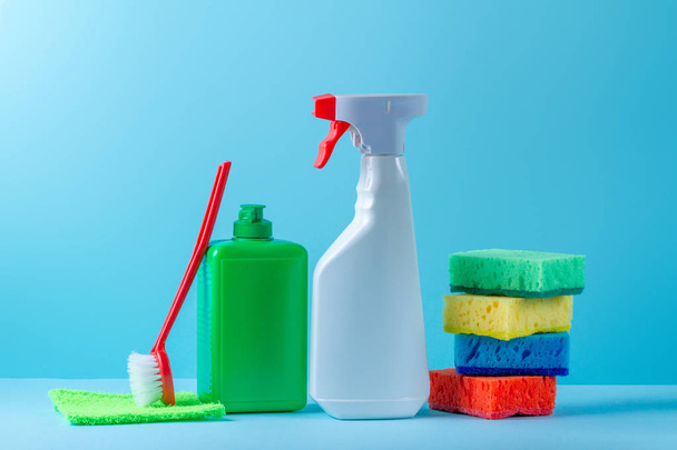 Products for cleaning houses on a blue background - Photo, image