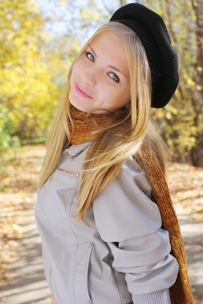 Young blond Teen Girl Standing in a Park - Valokuva, kuva