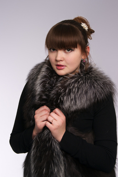 beautiful girl in a fur cape - Fotografie, Obrázek