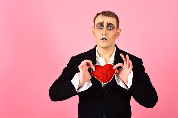 In love again and always. Mime man hold red heart for valentines day. Mime actor with love symbol. Theatre actor pantomime falling in love. Love confession on valentines day - Foto, imagen