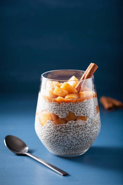 chia pudding with cinnamon simmered apples and peanut butter - Photo, image