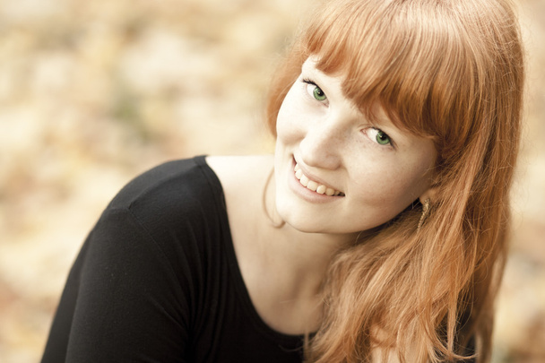 Cheerful young red haired girl - Foto, Imagen
