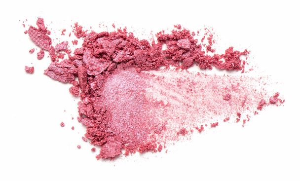 Eye shadow on a white background. Scattered blush sample for makeup. Red color. - Φωτογραφία, εικόνα