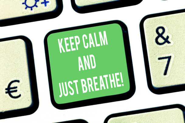 Scrivere un biglietto che mostri "Keep Calm And Just Breathe". Business photo showcase Prenditi una pausa per superare le difficoltà quotidiane Tasti della tastiera Intenzione di creare messaggi informatici premendo l'idea della tastiera
. - Foto, immagini