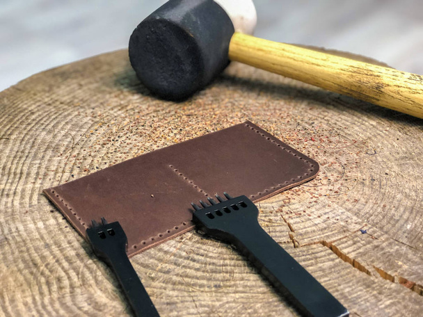 master leather products produces work from the skin. - Φωτογραφία, εικόνα