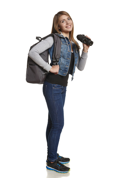 Girl hiker with backpack and binoculars - Φωτογραφία, εικόνα