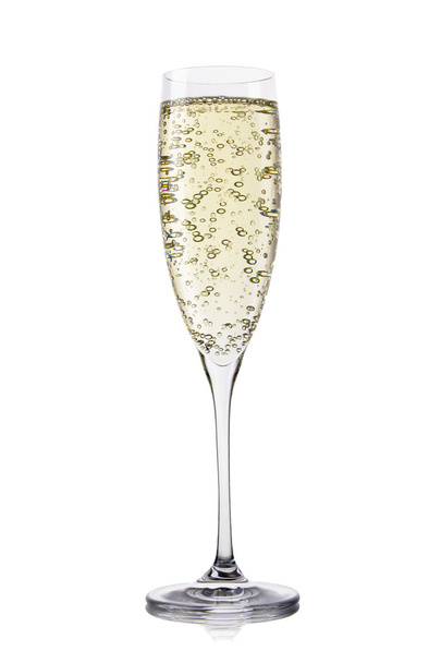 A glass of champagne, isolated on a white background. - Foto, Bild
