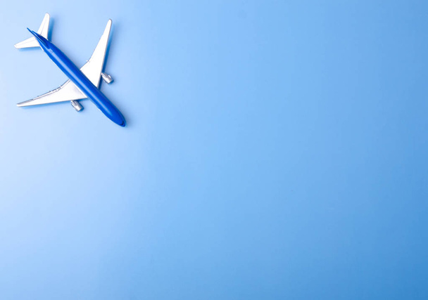 Blue model plane,airplane on color blue background - Φωτογραφία, εικόνα