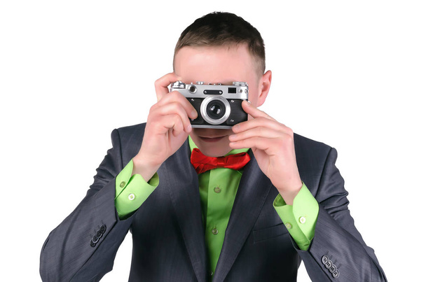 Photographer with retro style film photo camera isolated on a white background. - Zdjęcie, obraz
