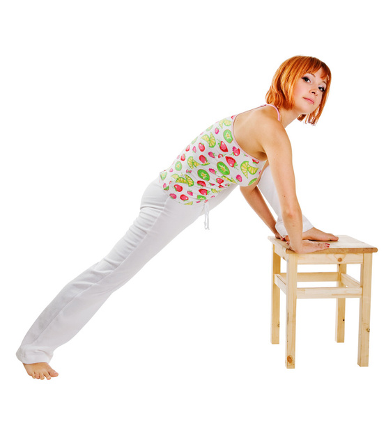 Fit red woman performing fitness exercises with - Φωτογραφία, εικόνα