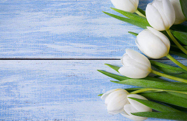 beautiful fresh tulips on wooden surface - Φωτογραφία, εικόνα