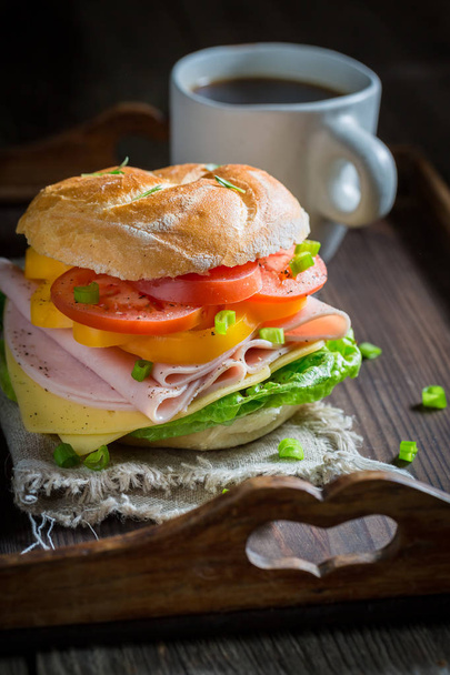 Healthy sandwich with vegetables and ham on wooden table - Foto, Imagen