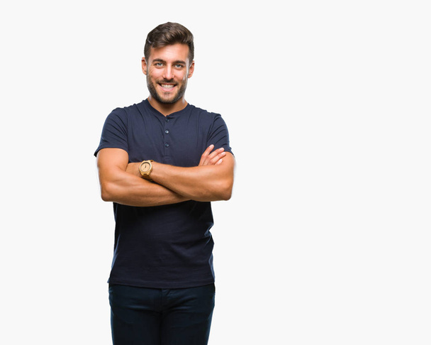 Young handsome man over isolated background happy face smiling with crossed arms looking at the camera. Positive person. - Photo, image