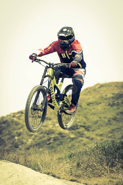 man in fly with MTB  - Photo, Image