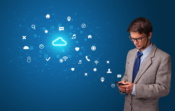 Person using phone with cloud technology concept - Photo, Image