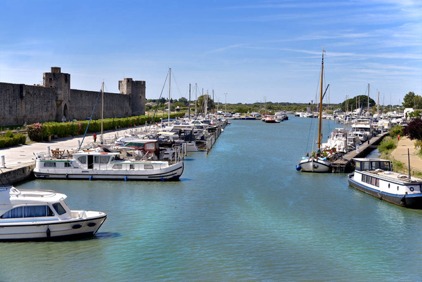 Port of Aigues Mortes, French city walls in the Gard department in the Occitanie region of southern France - Photo, Image