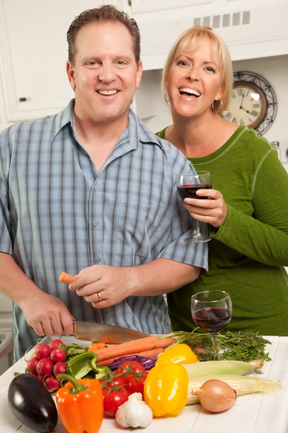 Couple Drinking Wine in the Kitchen - Foto, afbeelding