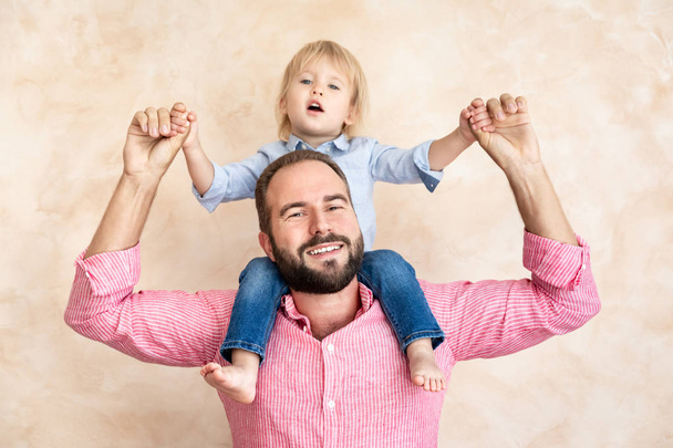 Man and child at home. Father and son having fun together. Family holiday concept. Happy Father's day - Photo, image
