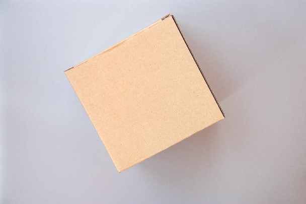 Closed big square cardboard craft gift box - Φωτογραφία, εικόνα