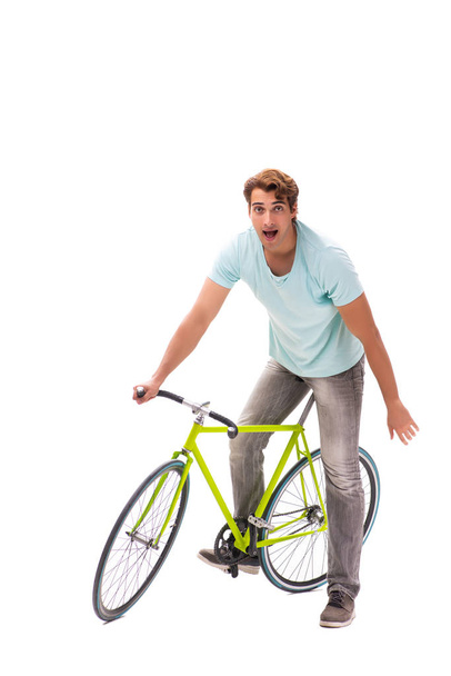 Young man riding a bicycle isolated on white background - 写真・画像