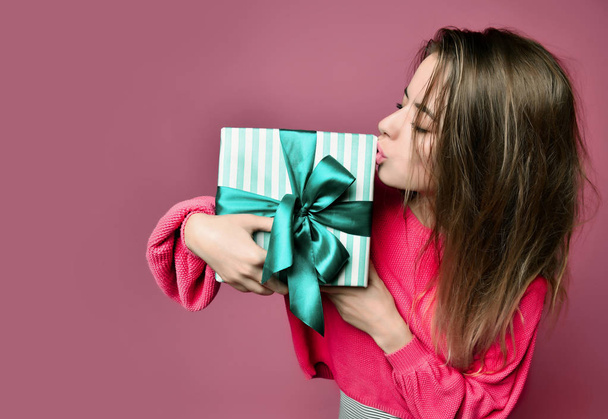 Beautiful woman with shopping presents gift box for happy valentines day on pink  - Zdjęcie, obraz