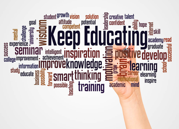 Keep educating word cloud and hand with marker concept on white background. - Photo, Image