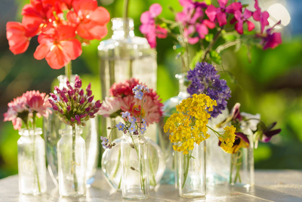 summer flowers  in vases, close up - Foto, Imagem