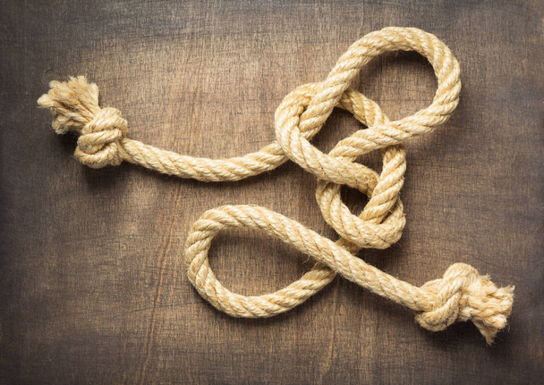 ship rope at wooden background surface, top view - Foto, Imagem
