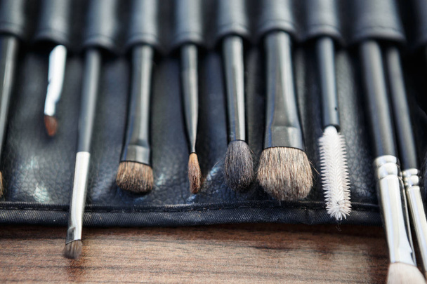 Close up on professional visage brushes set in beauty salon.Make up artist brush kit for beautiful face paint.Cosmetic & skin care make-up products.Visagiste accessories toolkit - Photo, Image