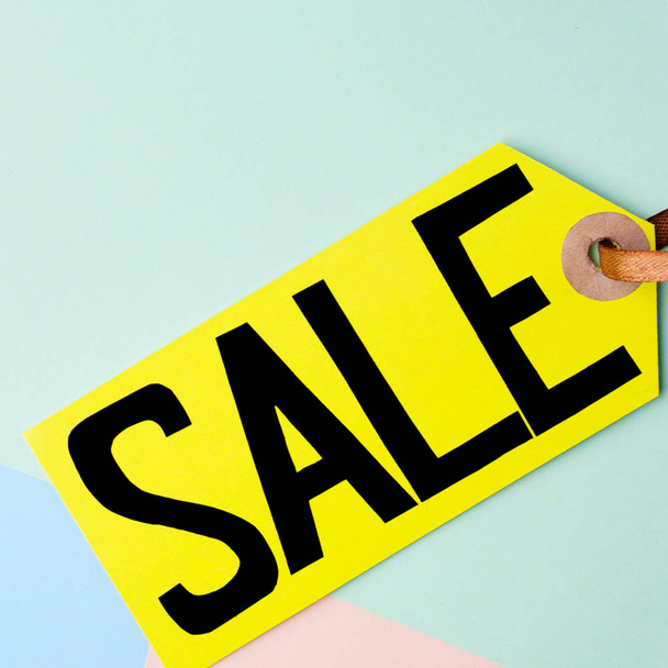 spring sale, price tag on pastel background  - Фото, зображення