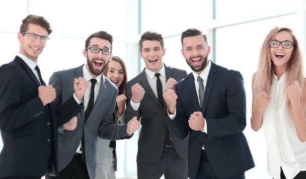 happy business team standing in office. - Фото, изображение