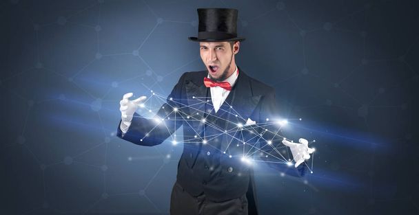 Magician with geometrical connection on his hand  - Photo, image