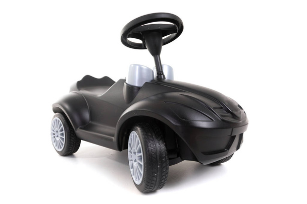 carro de brinquedo preto isolado no fundo branco
 - Foto, Imagem