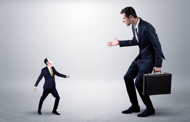 Conflict between small and big businessman - Фото, зображення