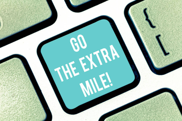 Word writing text Go The Extra Mile. Business concept for Give an additional do more than is expected from you Keyboard key Intention to create computer message pressing keypad idea. - Photo, Image