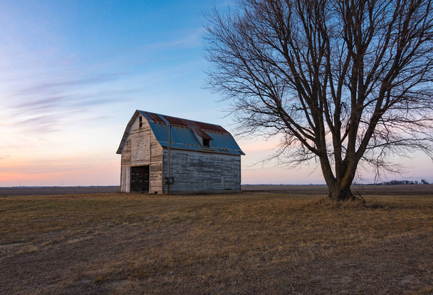Old rustic barn as the sun sets.  Ogle County, Illinois, USA - Photo, Image