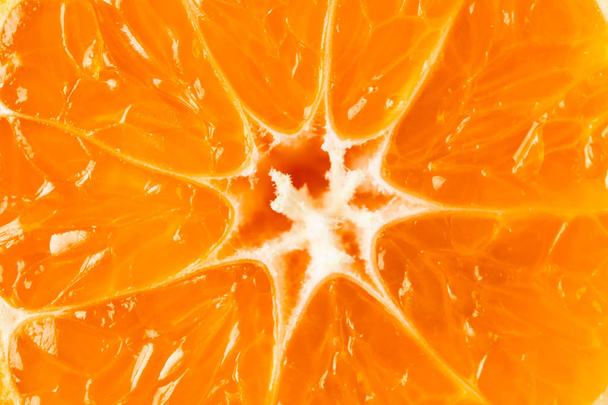 Bright, juicy food background, close-up of orange pulp. - Photo, image