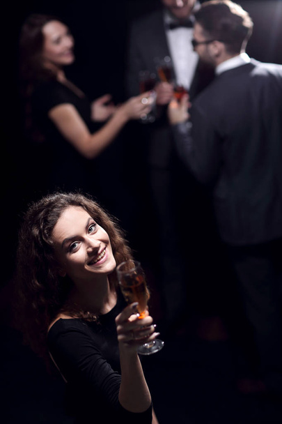 stylish young woman with glass of champagne - Foto, Bild