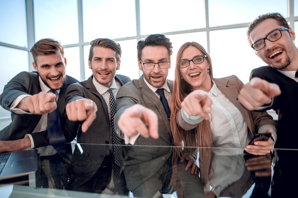 Entrepreneurs point their finger at you while sitting - Foto, Bild