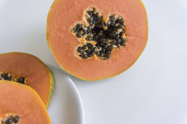 Close up of papaya on white background. - Φωτογραφία, εικόνα